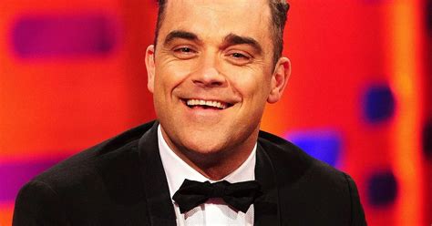 robbie williams gay|Robbie Williams gay: Singer reveals he is 49 per cent。